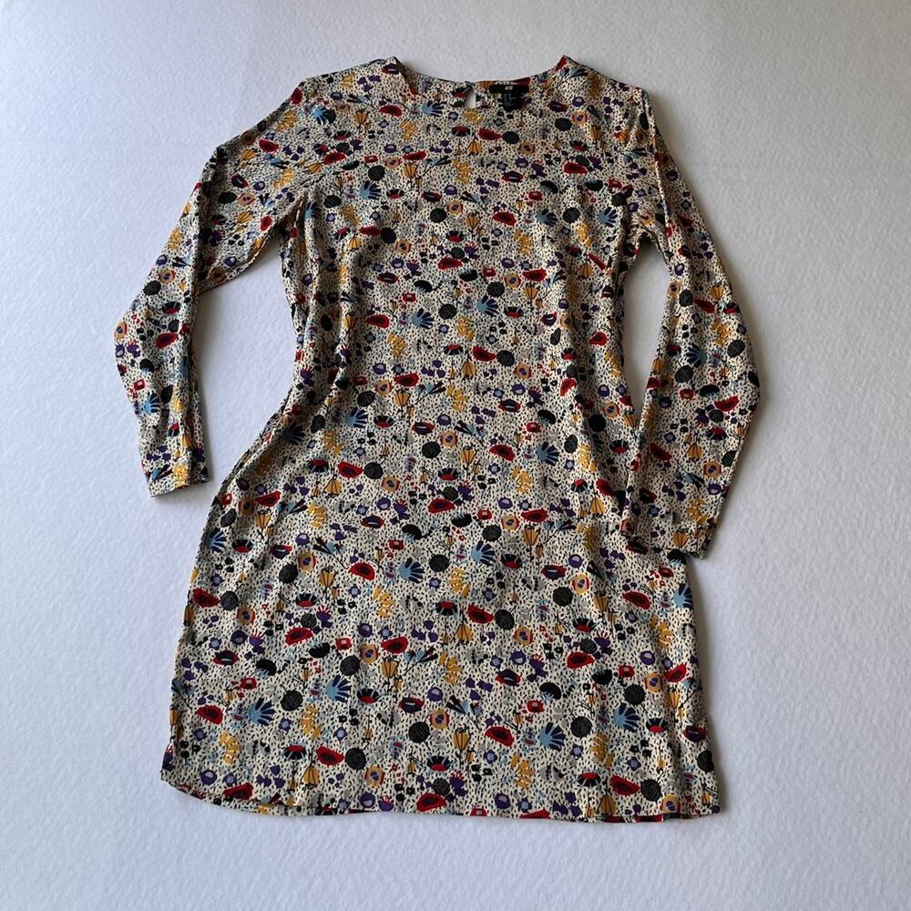 Eclectic H&M multicolored floral print mini dress with long sleeves.